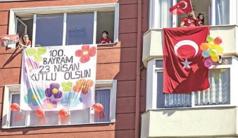 Turkish populace celebrate national day from their balconies